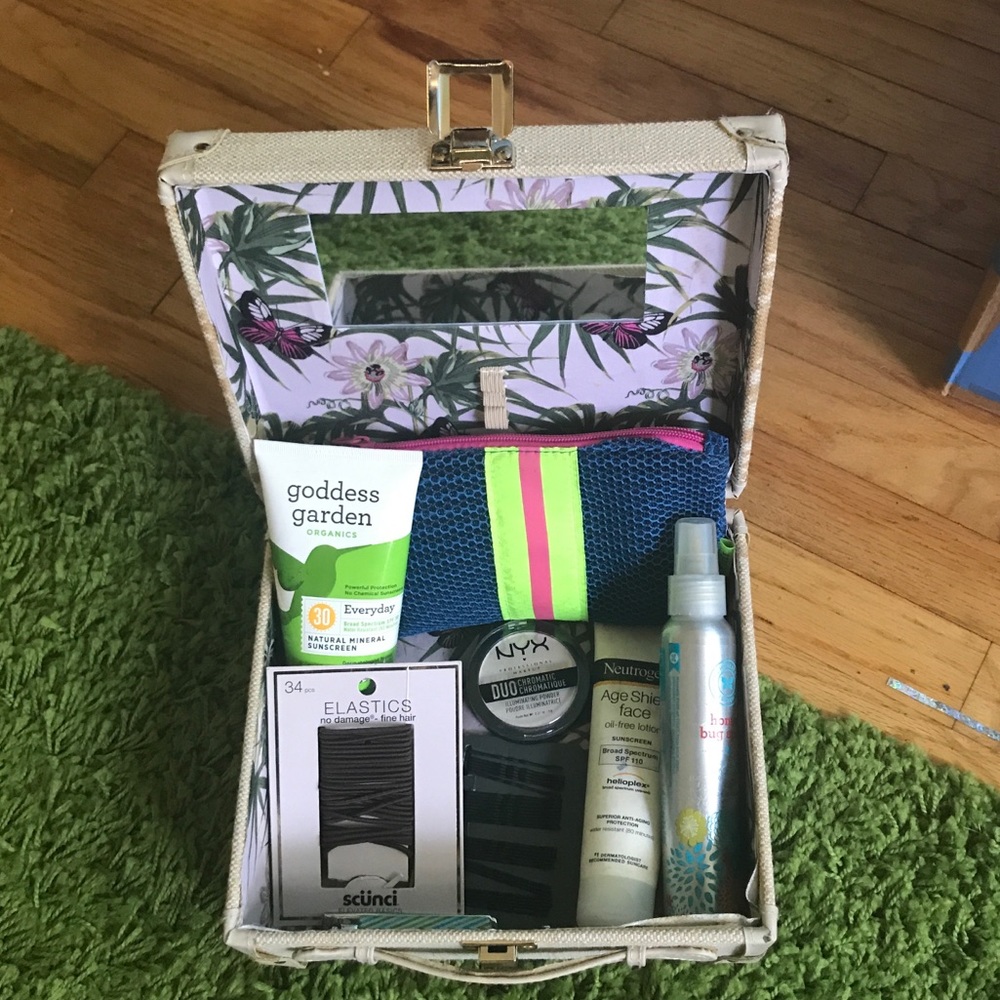 Makeup box with various items inside